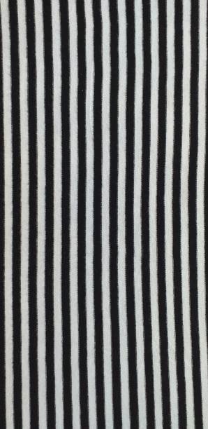 istock Full frame of black and white stripes fabric 1329797902