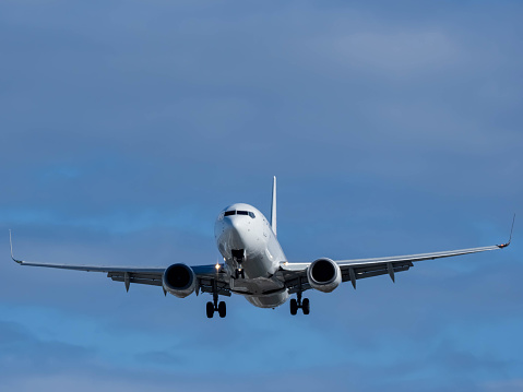 Portland, Oregon, USA - October 20, 2023: A Delta Airlines 737 departs on runway 28R at Portland International Airport.