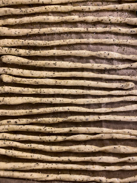 Ready to put in owen bread-sticks close-up view of