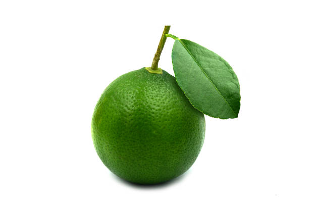 istock Green lemon fresh picture isolated on the white background. 1329807156