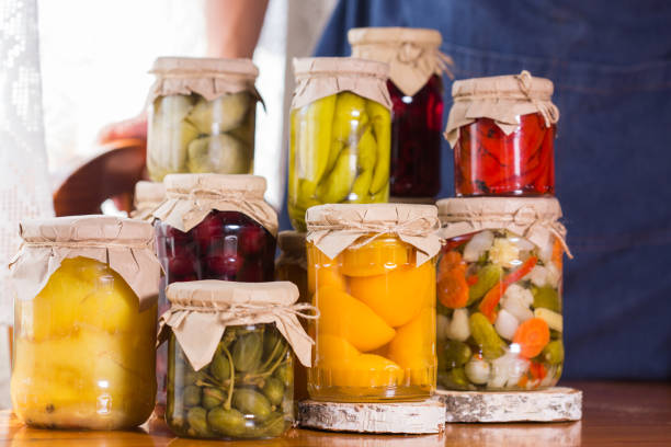 istock Young man holding in hands preserved food 1329811982