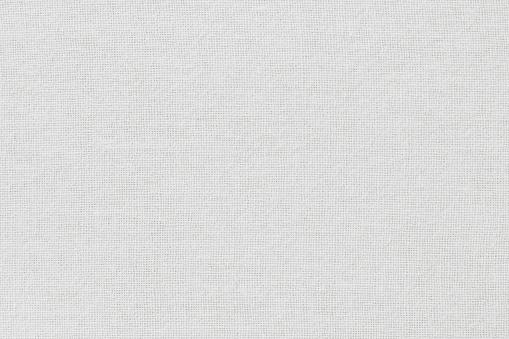Textura de tela de tela de algodón blanco para el fondo, patrón textil natural. photo
