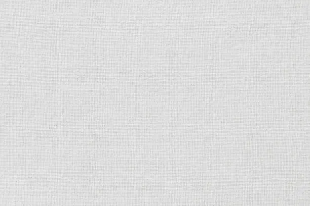 Photo of White cotton fabric cloth texture for background, natural textile pattern.