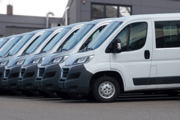 istock White delivery vans are ready for new orders 1329814412