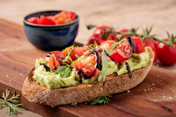 istock Avocado Toast with a Tomato Salsa Topping and Balsamic Vinegar 1329818792