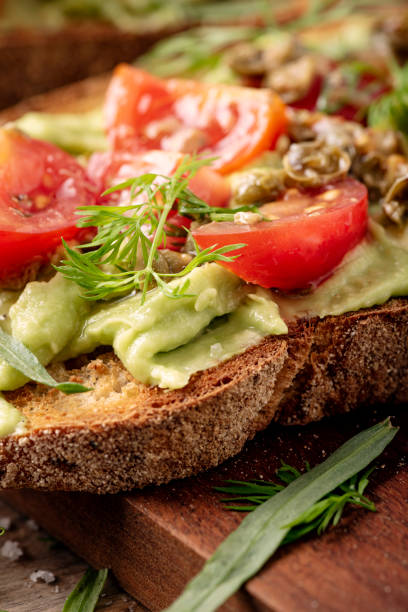 istock Avocado Toast with a Tomato Salsa Topping. 1329818850