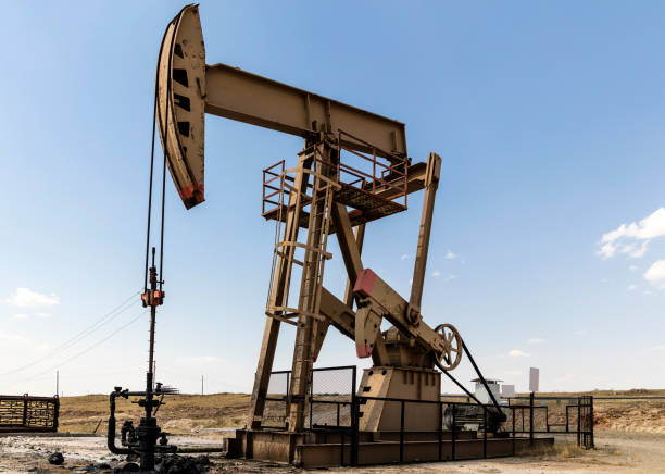 istock Oil field, oil pump in the work 1329820367
