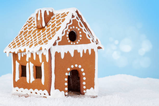 istock Christmas greeting card with gingerbread house 1329820957