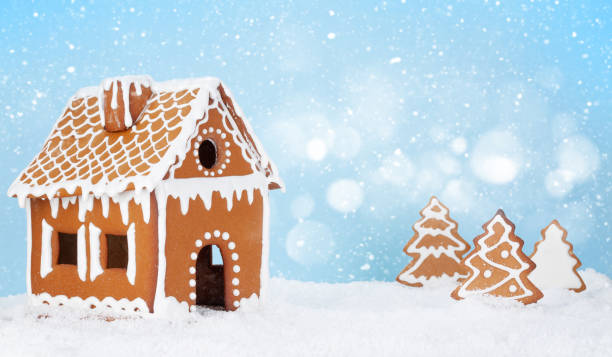 istock Christmas greeting card with gingerbread house 1329820981