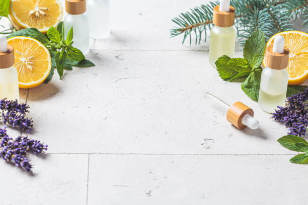 istock Different types of essential oils in glass bottles and ingredients for making essential oils. Skin and body care concept. 1329822645