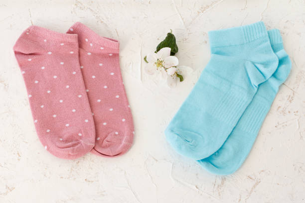 istock Two pair of women socks on white background. 1329826290