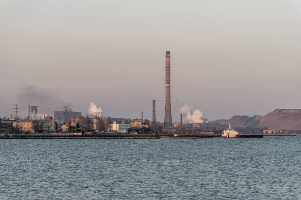 istock Factory with air pollution smoke from chimneys, environmental problems. Industry air pollution concept. Ecological catastrophe. 1329826488