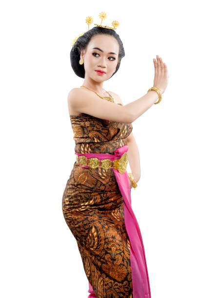 Asian woman dancing Java traditional dance (Sekar Puri dance) Asian woman dancing Java traditional dance (Sekar Puri dance) isolated over white background batik indonesia stock pictures, royalty-free photos & images