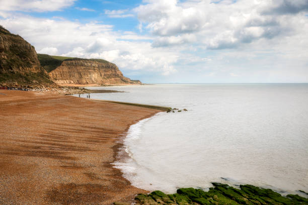 istock Pebbled Beach and Dramatic Cliffs Looking East from the Stade, Hastings, England 1329831402