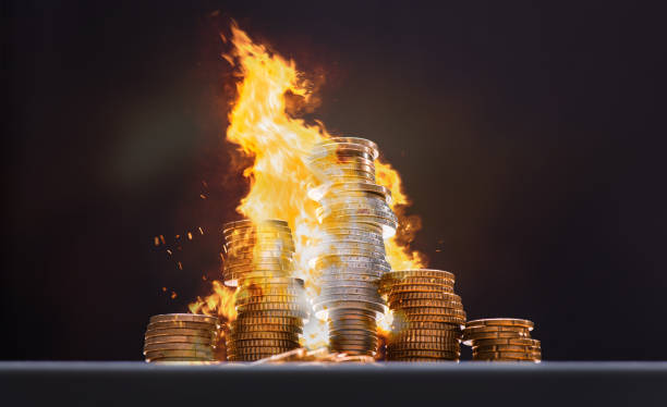 Money on fire - amount of burning money concept stock photo