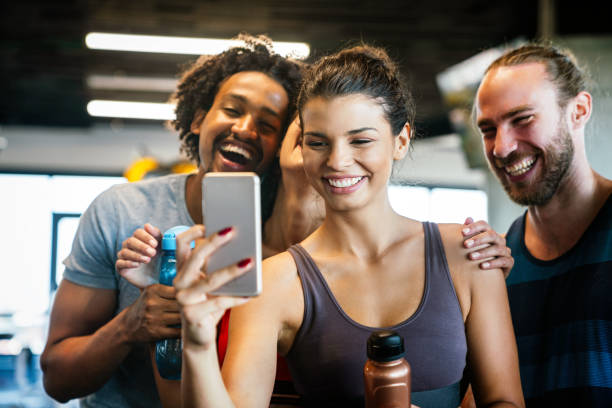 istock Friends making selfie in the gym after workout 1329833264