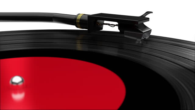 Old fashioned music plays on the vinyl record on the white background