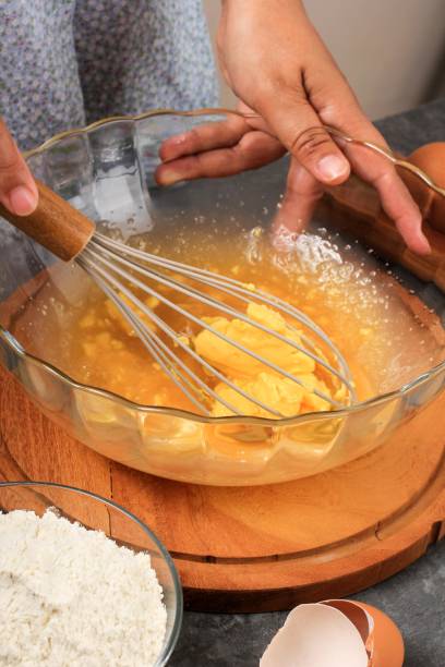 istock Dough Making, A Female Hand Preparing Baking in the Kitchen 1329834154