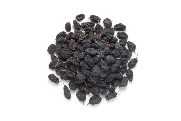 istock Pile of black currant raisins 1329834474