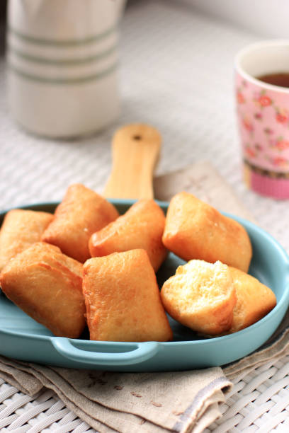 istock Indonesian Fried Bread Called Roti/Kue Bantal or Famous Name Odading 1329835500