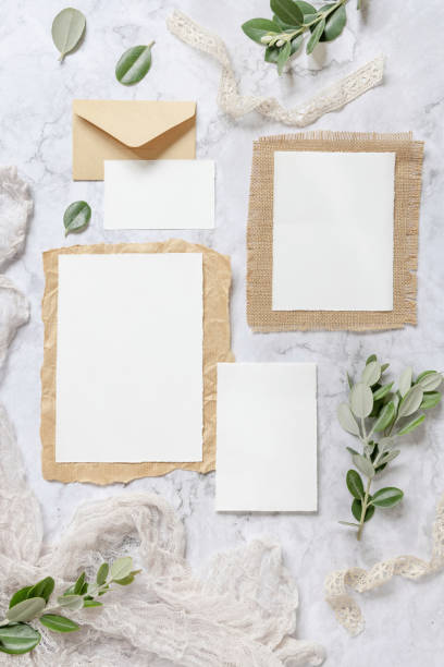 istock Wedding stationery set with envelope laying on a marble table 1329841590
