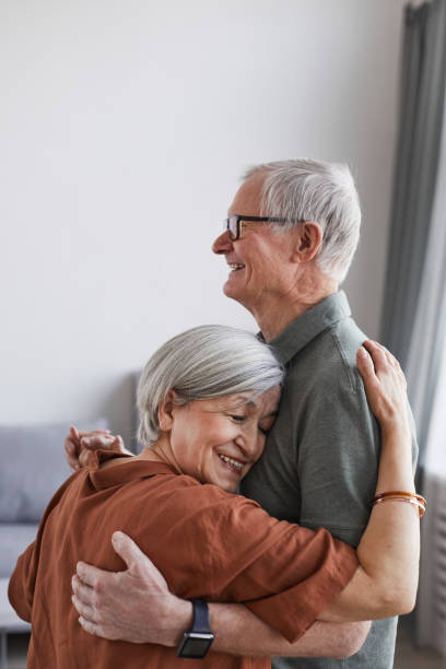 istock Senior Couple Dancing at Home 1329844117