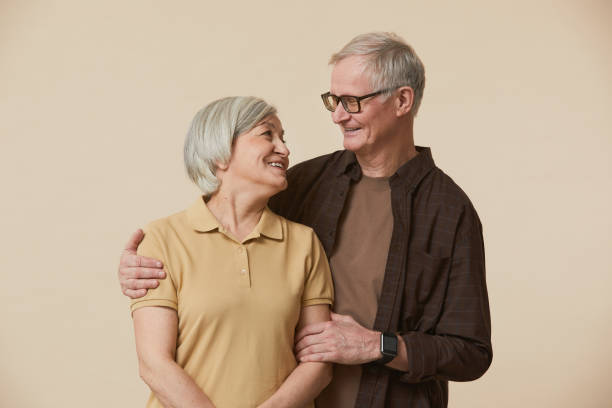 istock Smiling Mature Couple Minimal 1329844192