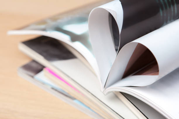 Pages of book curved into a heart shape, close up