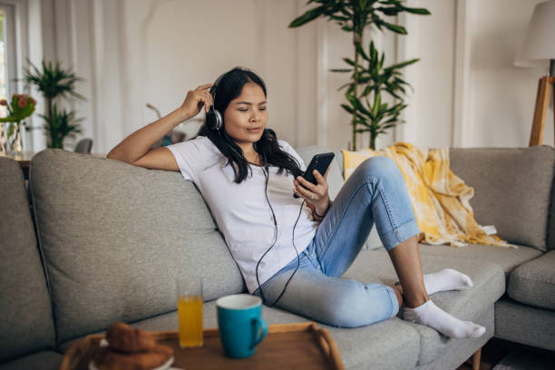 istock Woman relaxing at home 1329850867