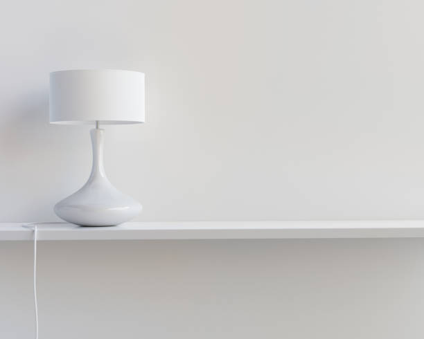 istock Lamp standing on the shelf in minimalistic white interior. 3D render. 1329851433