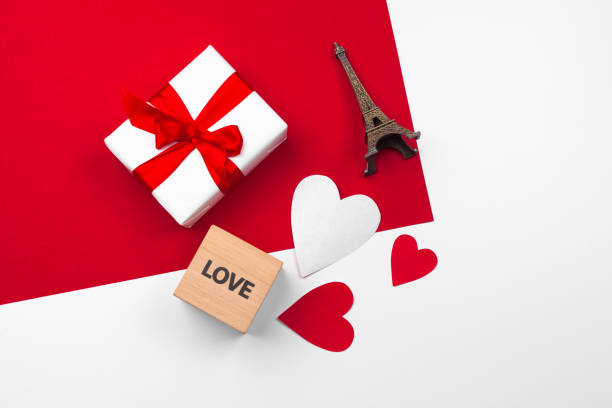 istock Mug with chocolate hearts on red background. Flat lay composition. Romantic, St Valentines Day concept 1329851467