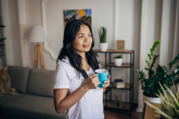 istock Woman at home 1329851626