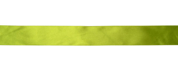 istock green silk ribbon on white background, gift wrapping decor 1329853704