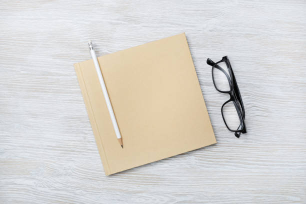 istock Sketchbook, pencil, glasses 1329854144