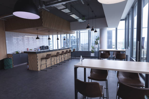 istock Interior of empty cafeteria with tables in modern office 1329854334