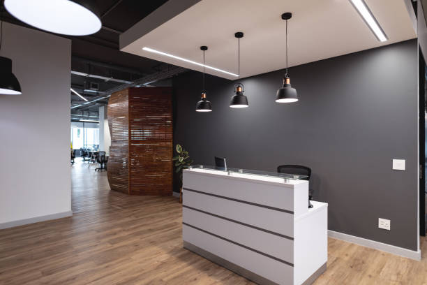 istock Interior of empty lobby with reception counter in modern office 1329855170