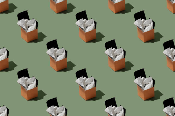 istock Seamless pattern of open paper delivery box on green background 1329863753
