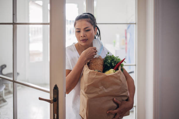 istock Female back home from shopping 1329864903