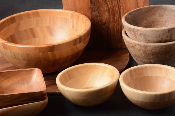 istock Culinary background, empty ceramic plates, wooden or bamboo spoons and bowls 1329868369