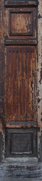 istock ancient worn out texture of wood with ornaments in a decorative vertical panel, with squares and lines carved - background with a retro texture 1329874638