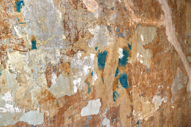 istock ancient spooky surface of a damaged wall with abstract texture - irregular background wallpaper 1329876547