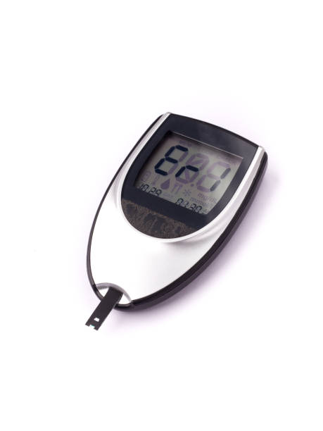 istock Blood glucose meter, the blood sugar value is measured on a finger on white background. 1329876702