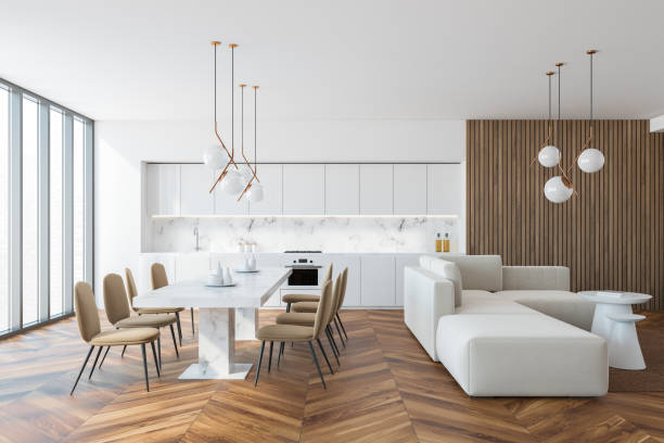istock White and wooden kitchen interior with dining table and sofa 1329877467