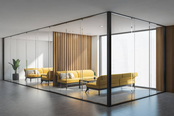 istock Two office waiting rooms corner with yellow sofas 1329879844