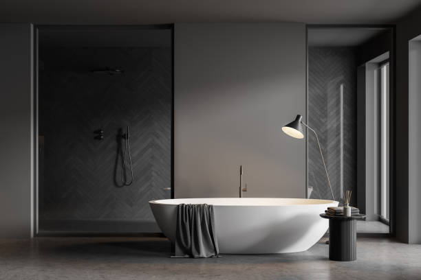 istock Gray bathroom interior with tub and shower stall 1329880697
