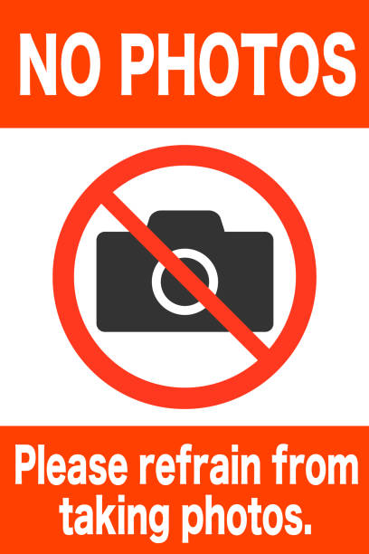 No Photography sign No Photography sign. Red diagonal line and black camera. Vector illustration. no photographs sign stock illustrations