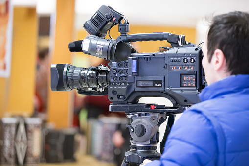 Belarus, Gomel, on March 29, 2018. Community Center. Days of Russian Culture in Belarus.Male cameraman in a television studio. Video Operator