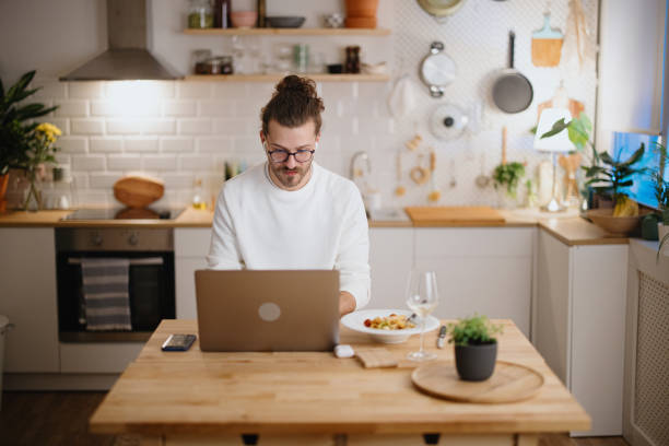istock Man working from his home late into the night 1329882592