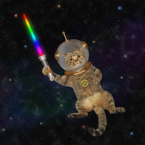 Cat astronaut with glowing sword A beige cat astronaut wearing a space suit with a glowing sword is in outer space. spacewalk photos stock pictures, royalty-free photos & images