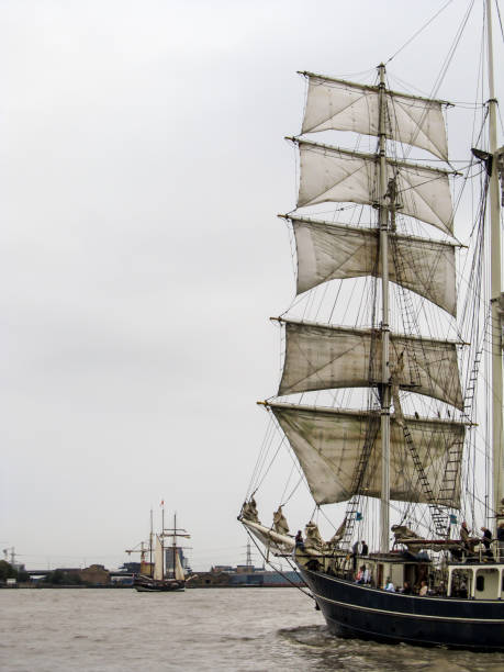 istock Sails of a Tallship, sailing down the Thames 1329883801